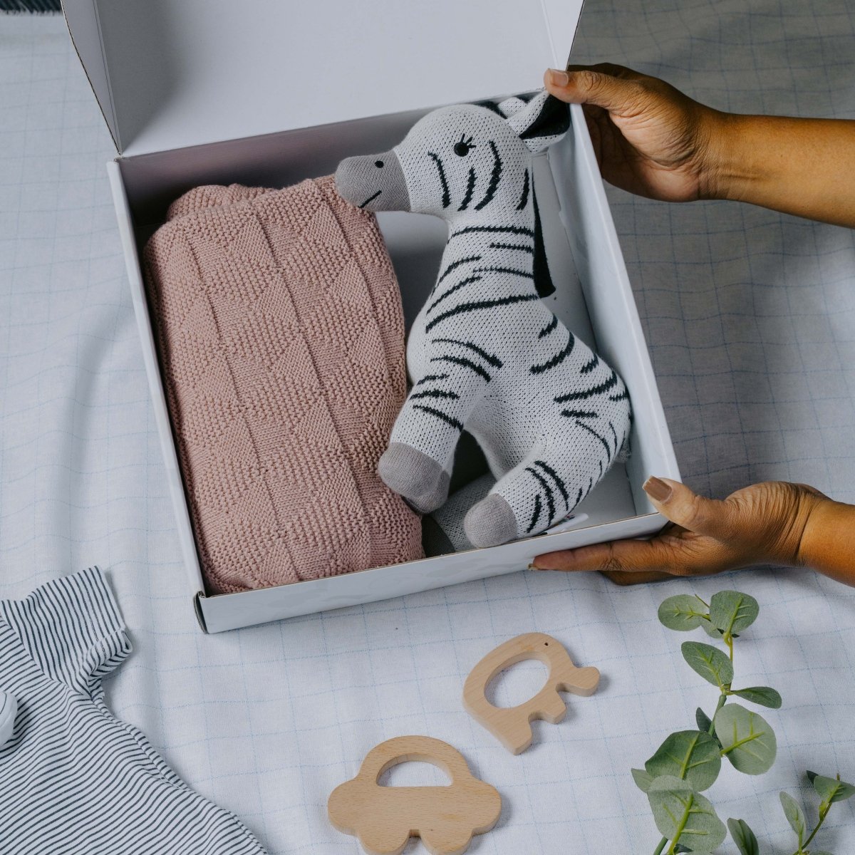 Newborn Gift Set – Swaddle, Zebra Plush Toy & Wooden Teethers